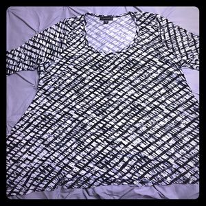 Karen Kane shark bite hem blouse